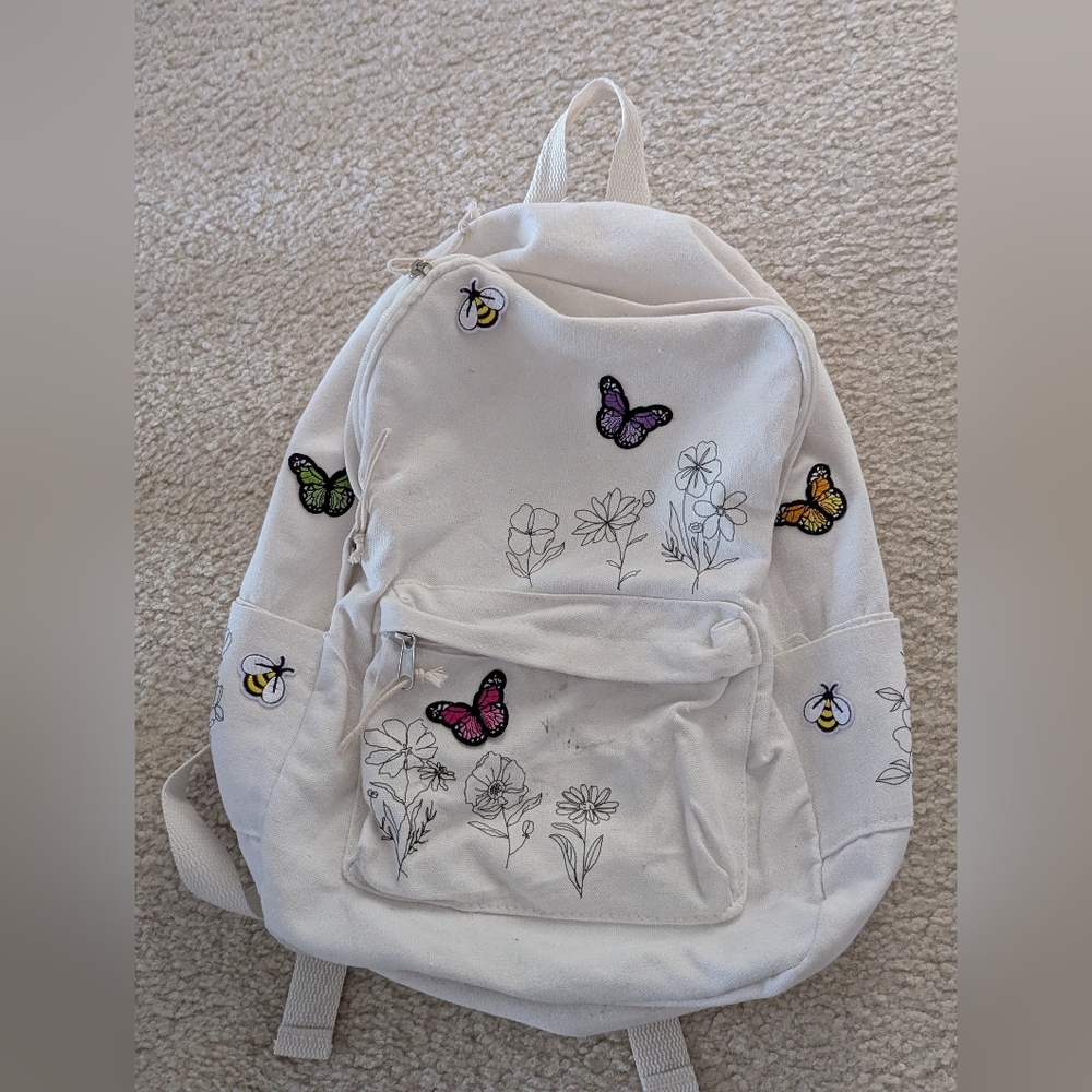 Butterfly floral patches white canvas back pack